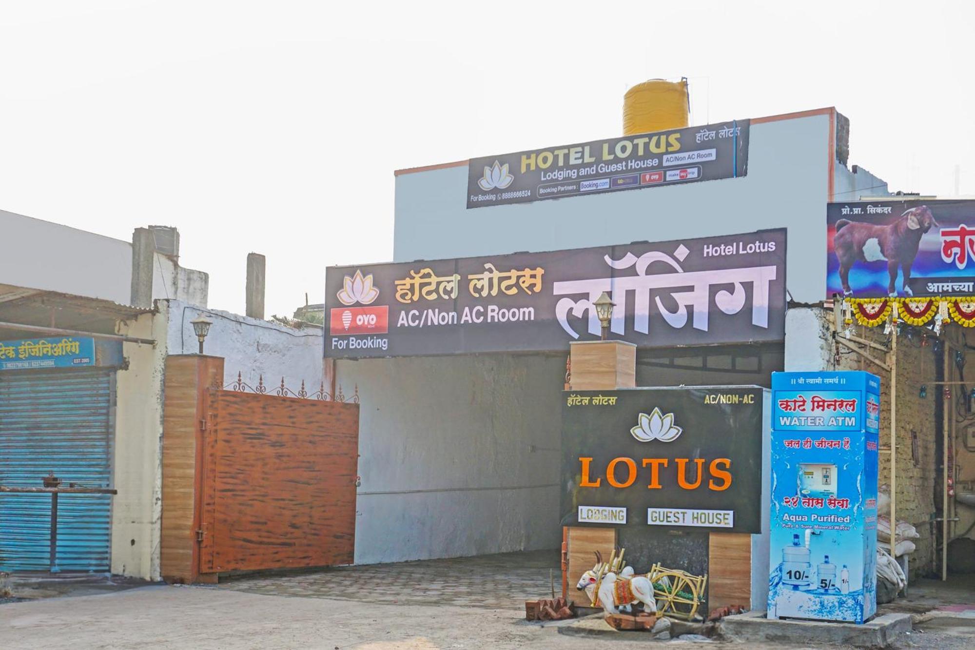 Oyo 820503 Lotus Lodge And Guest House Kharakvasla Bagian luar foto