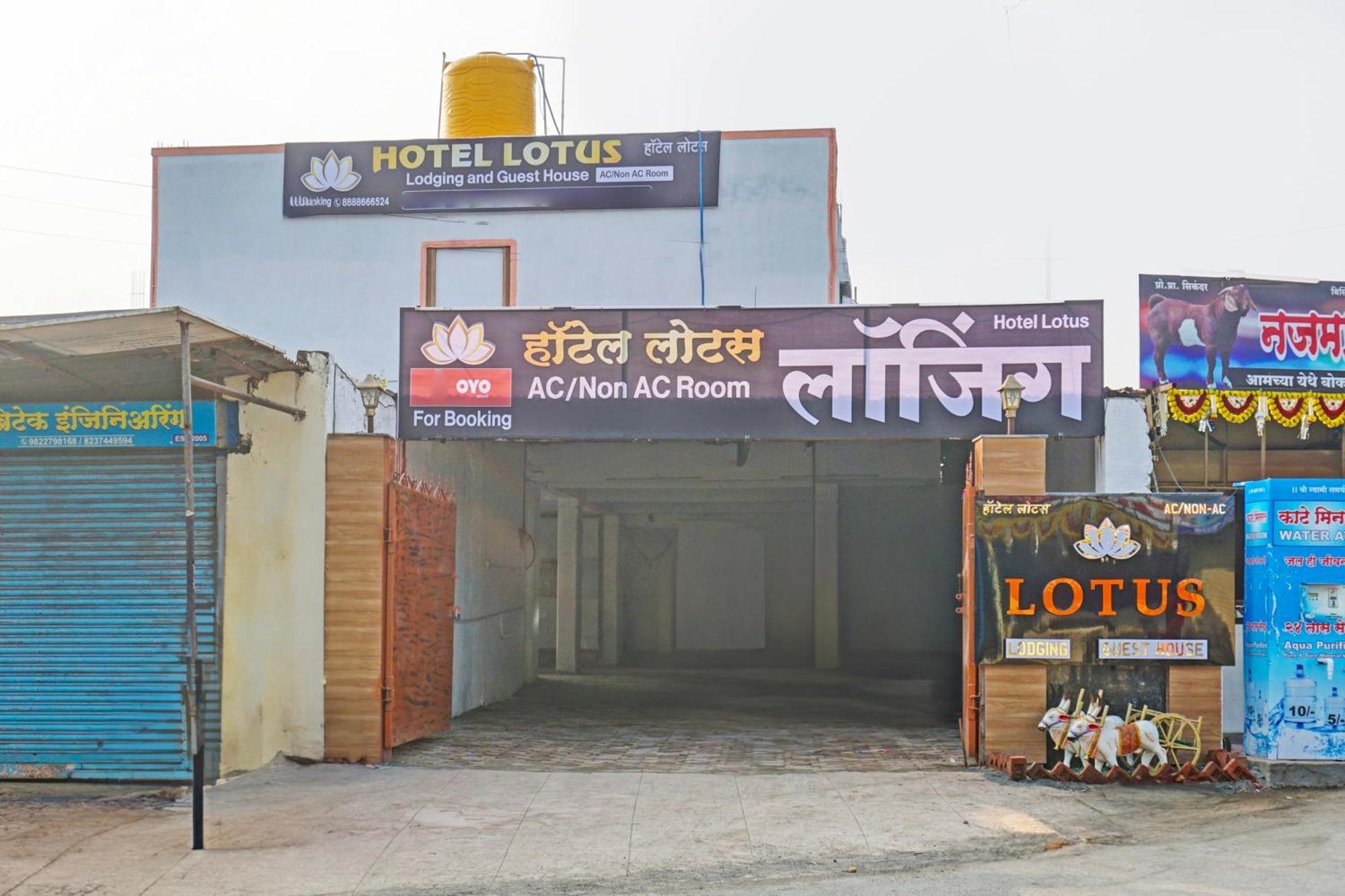 Oyo 820503 Lotus Lodge And Guest House Kharakvasla Bagian luar foto